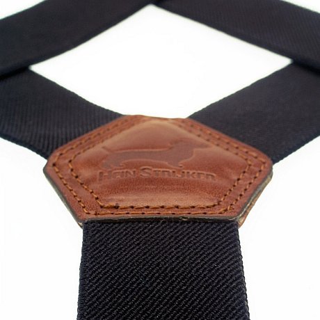 Black canvas suspenders with brown leather
