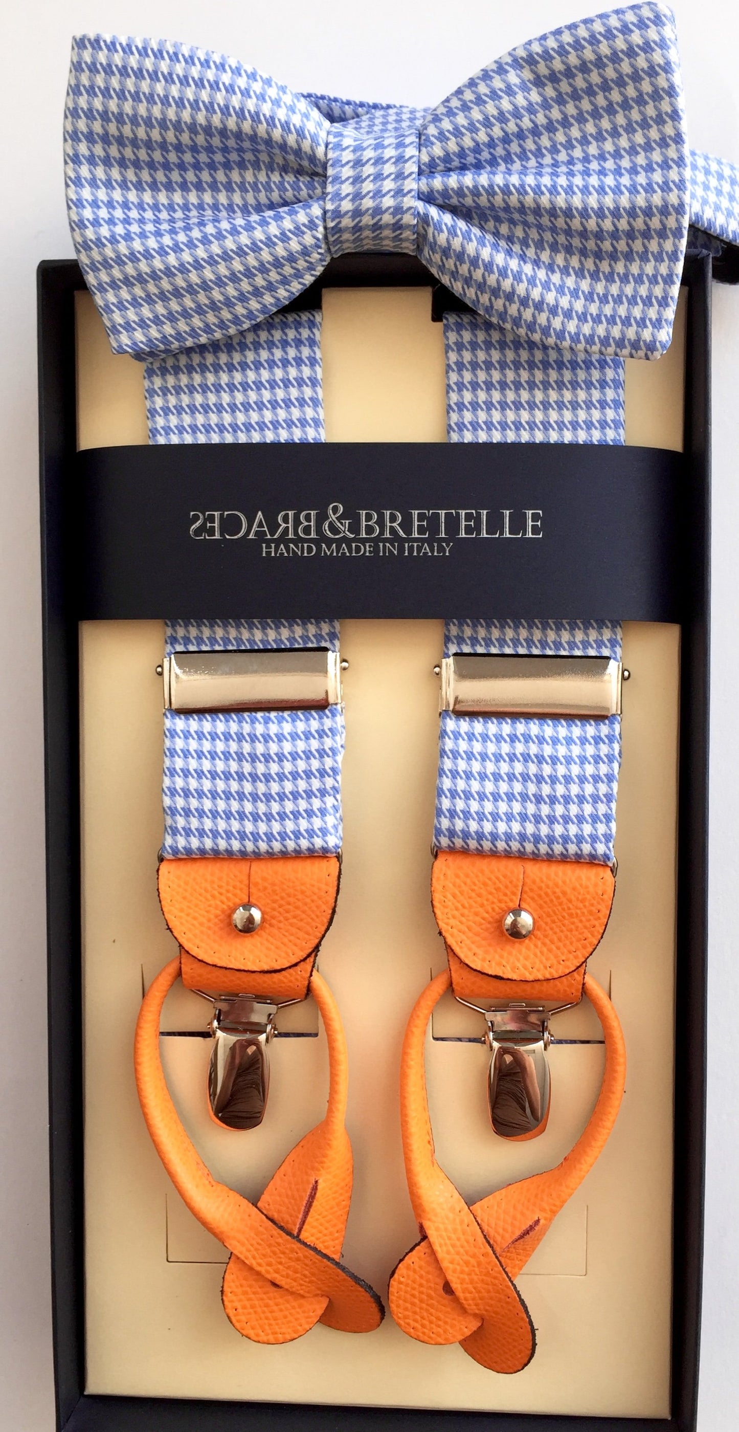 Blue and white suspenders plus bow tie